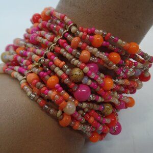 Multi Strand Beaded Bracelet Goldtone Hardware Elastic Pinks & Oranges 7" Wrist
